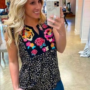 Cute floral print, embroidered top.